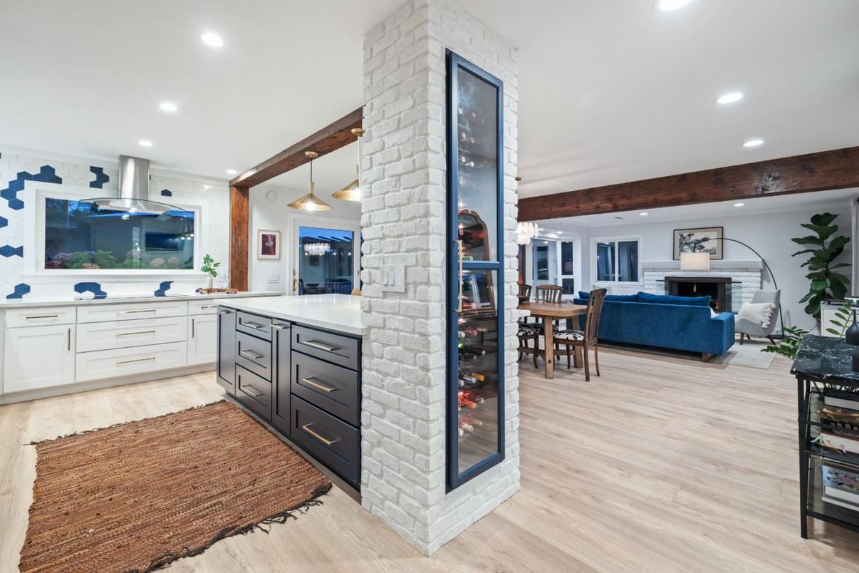 Dining room, Fireplace, Interior, Kitchen, Living room, Pendant Lights, Recessed Lighting, Stainless Steel Appliances, Stone Walls, Wood Texture Flooring