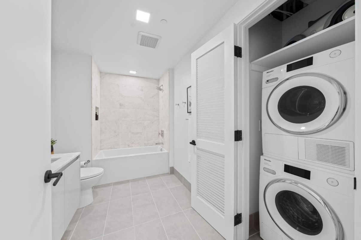 Bathroom, Interior, Marble Walls, Recessed Lighting, Utility Closets, Washer