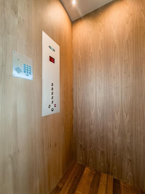 Elevator, Interior, Recessed Lighting, Wood Texture Flooring, Wooden Walls