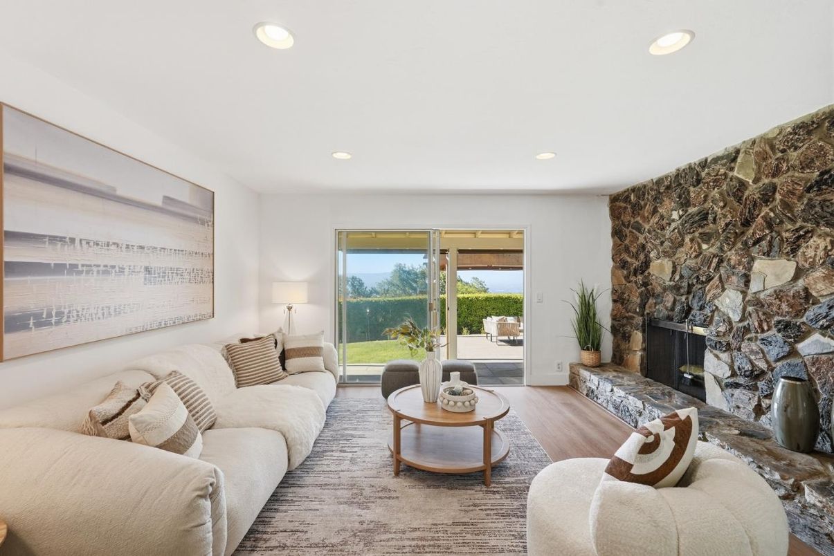 Fireplace, Interior, Living room, Recessed Lighting, Stone Walls, Wood Texture Flooring