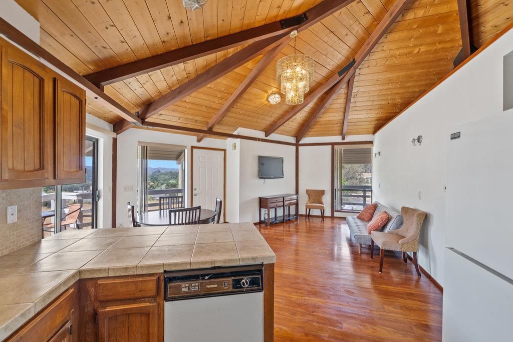 Dining room, Interior, Kitchen, Pendant Lights, Tile Countertops, Wooden Beams, Wooden Ceilings, Wood Texture Flooring
