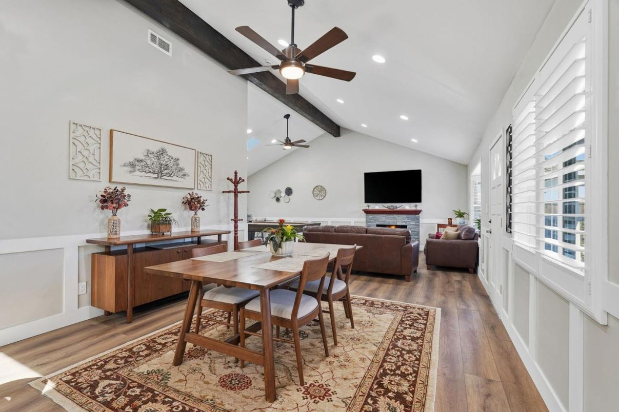 Dining room, Fireplace, Interior, Living room, Recessed Lighting, Wood Texture Flooring