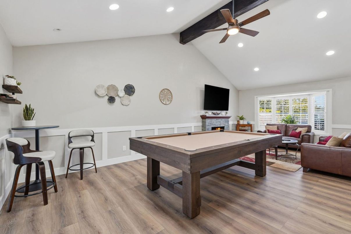 Billiard Table, Fireplace, Game Room, Interior, Living room, Recessed Lighting, Wooden Beams, Wood Texture Flooring