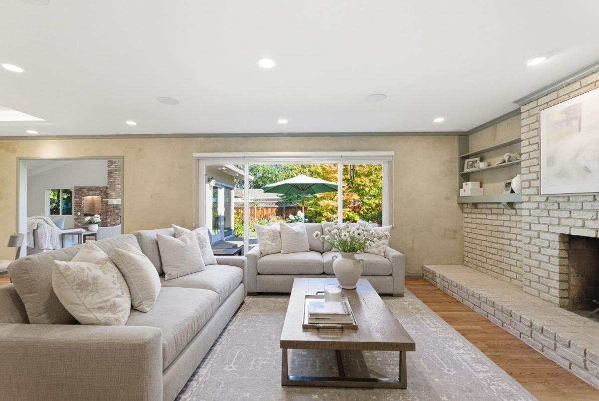 Fireplace, Interior, Living room, Recessed Lighting, Stone Walls, Wood Texture Flooring