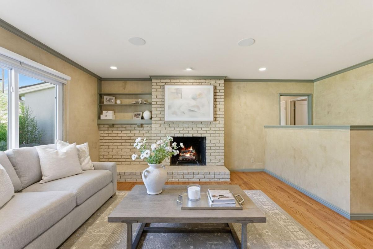 Fireplace, Interior, Living room, Recessed Lighting, Stone Walls, Wood Texture Flooring