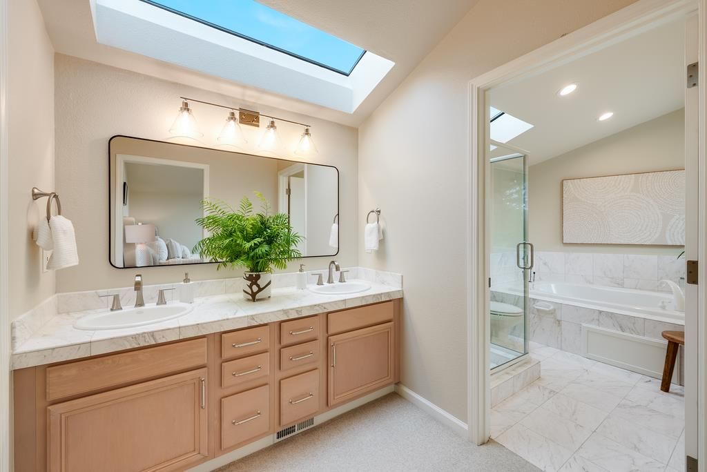 Bathroom, Dual Sink Vanities, Glass Shower, Interior, Marble, Recessed Lighting, Tile Countertops