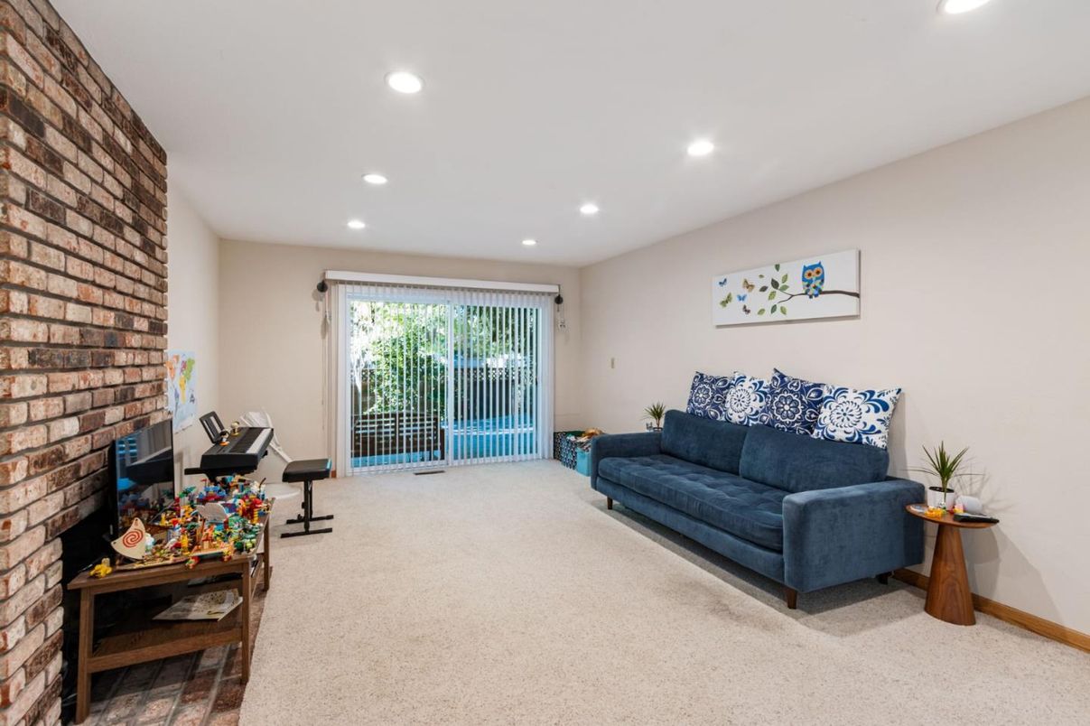 Fireplace, Fitness Equipment, Interior, Recessed Lighting, Stone Walls