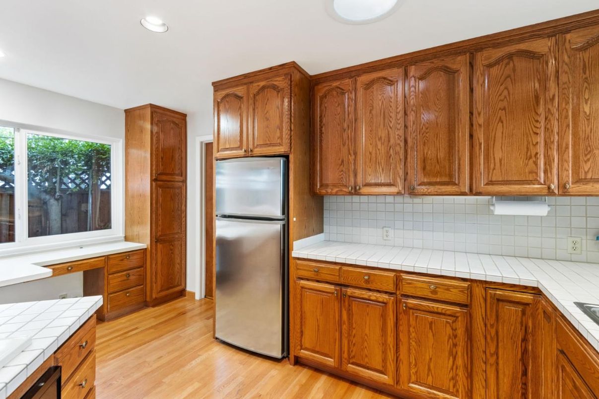 Interior, Kitchen, Recessed Lighting, Tile Countertops, Wood Texture Flooring