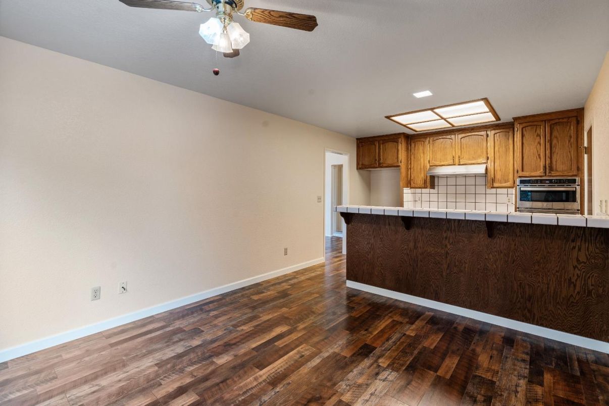 Interior, Kitchen, Tile Countertops, Wood Texture Flooring