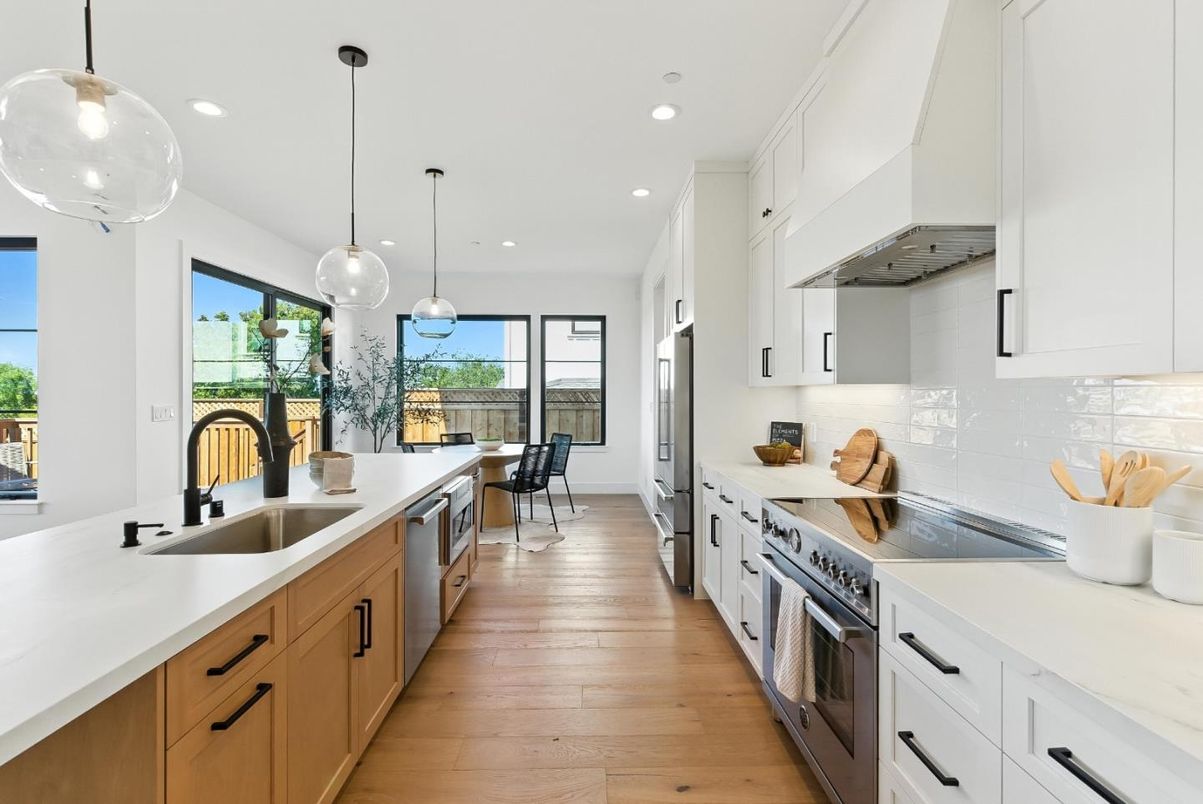 Dining room, Interior, Kitchen, Pendant Lights, Recessed Lighting, Stainless Steel Appliances, Wood Texture Flooring