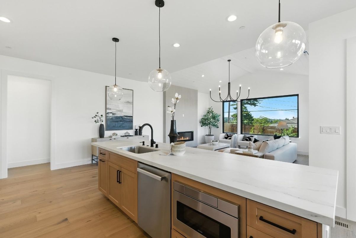 Fireplace, Interior, Kitchen, Living room, Pendant Lights, Recessed Lighting, Stainless Steel Appliances, Wood Texture Flooring