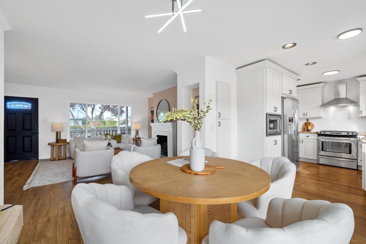 Dining room, Fireplace, Interior, Kitchen, Living room, Recessed Lighting, Stainless Steel Appliances, Wood Texture Flooring