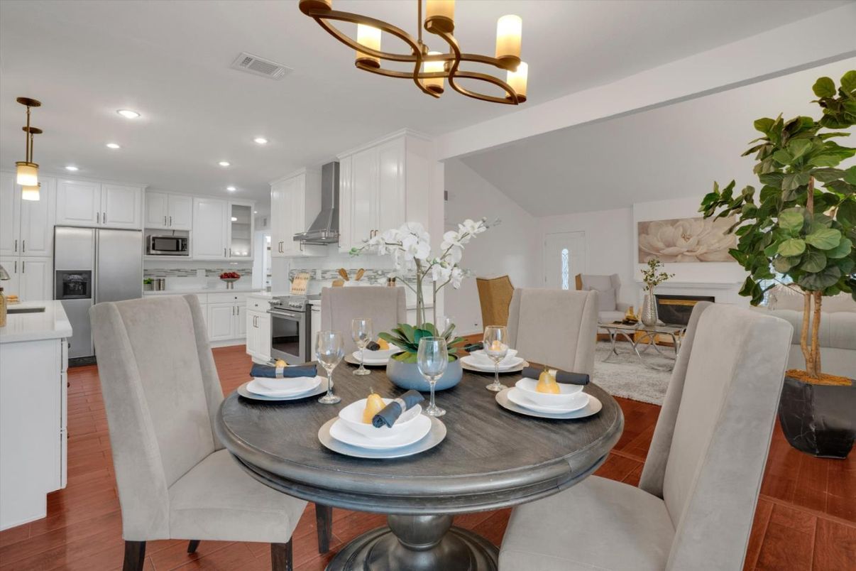 Dining room, Fireplace, Interior, Kitchen, Living room, Pendant Lights, Recessed Lighting, Stainless Steel Appliances, Wood Texture Flooring