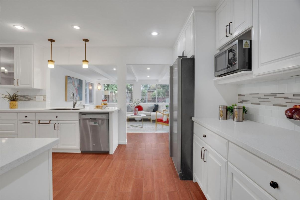 Dining room, Interior, Kitchen, Pendant Lights, Recessed Lighting, Stainless Steel Appliances, Wood Texture Flooring