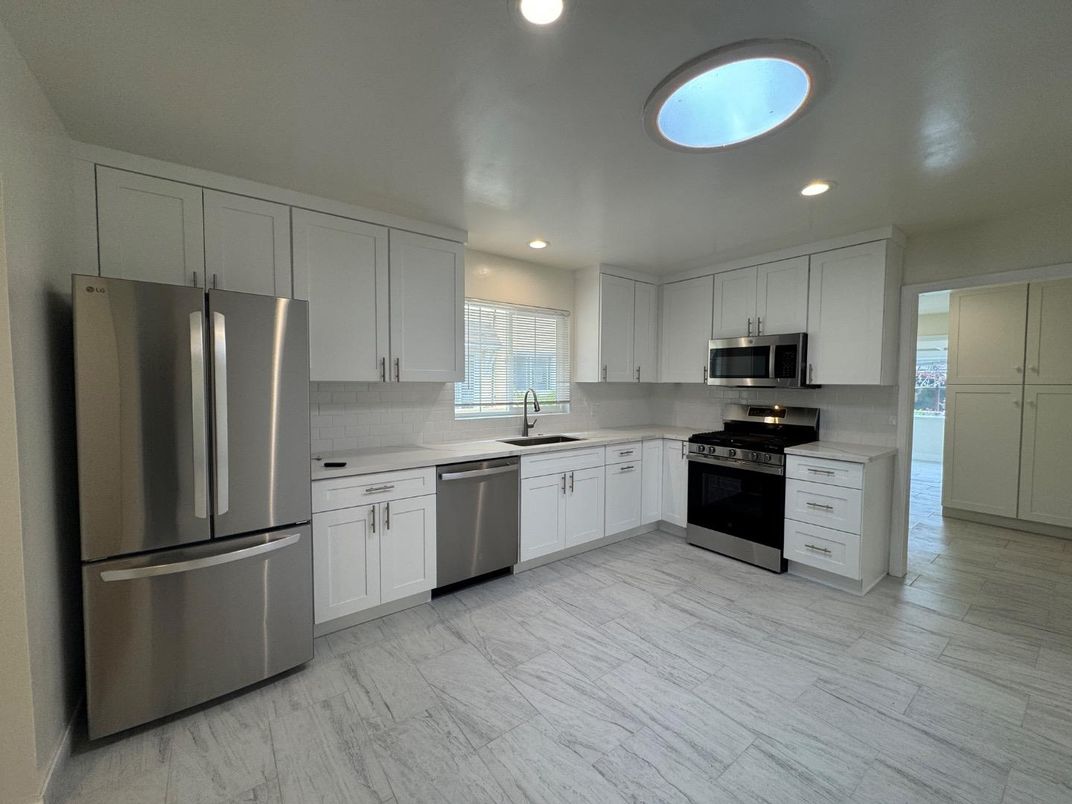 Interior, Kitchen, Marble, Recessed Lighting, Stainless Steel Appliances, Wood Texture Flooring