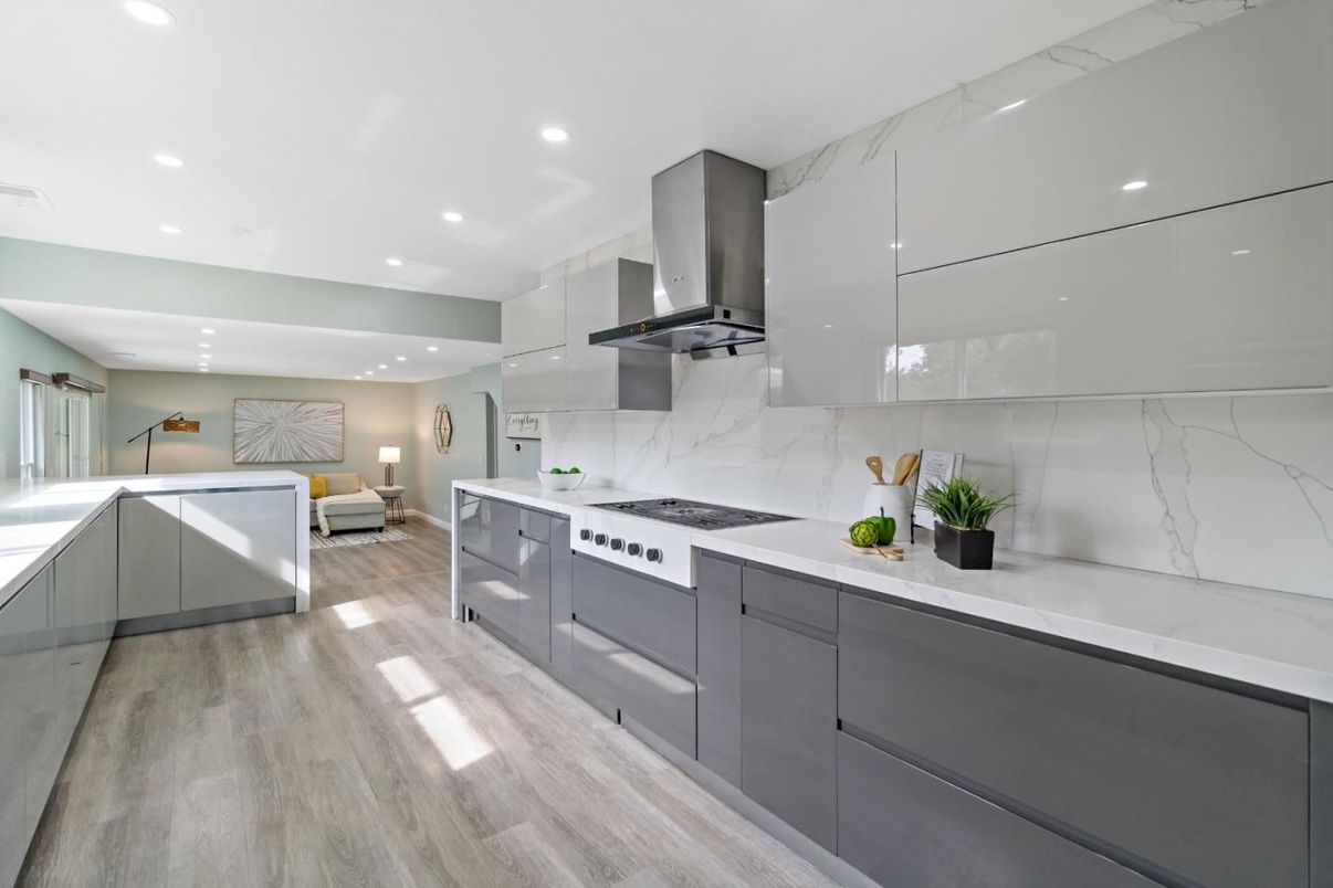 Interior, Kitchen, Living room, Marble Walls, Recessed Lighting, Stainless Steel Appliances, Wood Texture Flooring