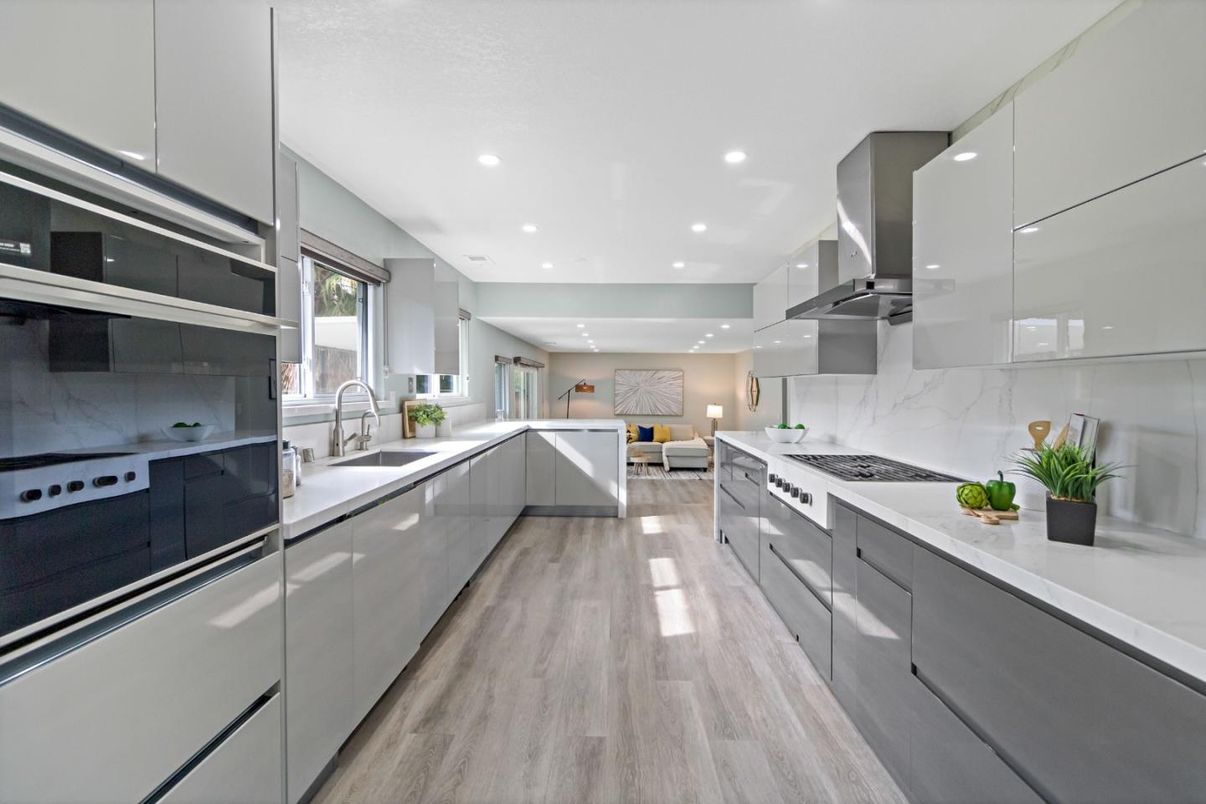 Interior, Kitchen, Living room, Marble Walls, Recessed Lighting, Stainless Steel Appliances, Wood Texture Flooring