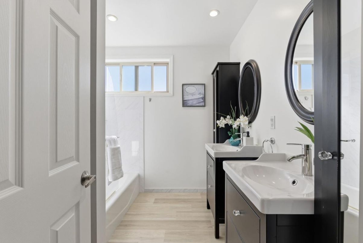 Bathroom, Dual Sink Vanities, Glass Shower, Interior, Recessed Lighting, Wood Texture Flooring