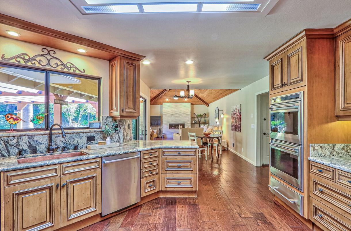 Chandelier, Dining room, Interior, Kitchen, Pendant Lights, Recessed Lighting, Stainless Steel Appliances, Wood Texture Flooring