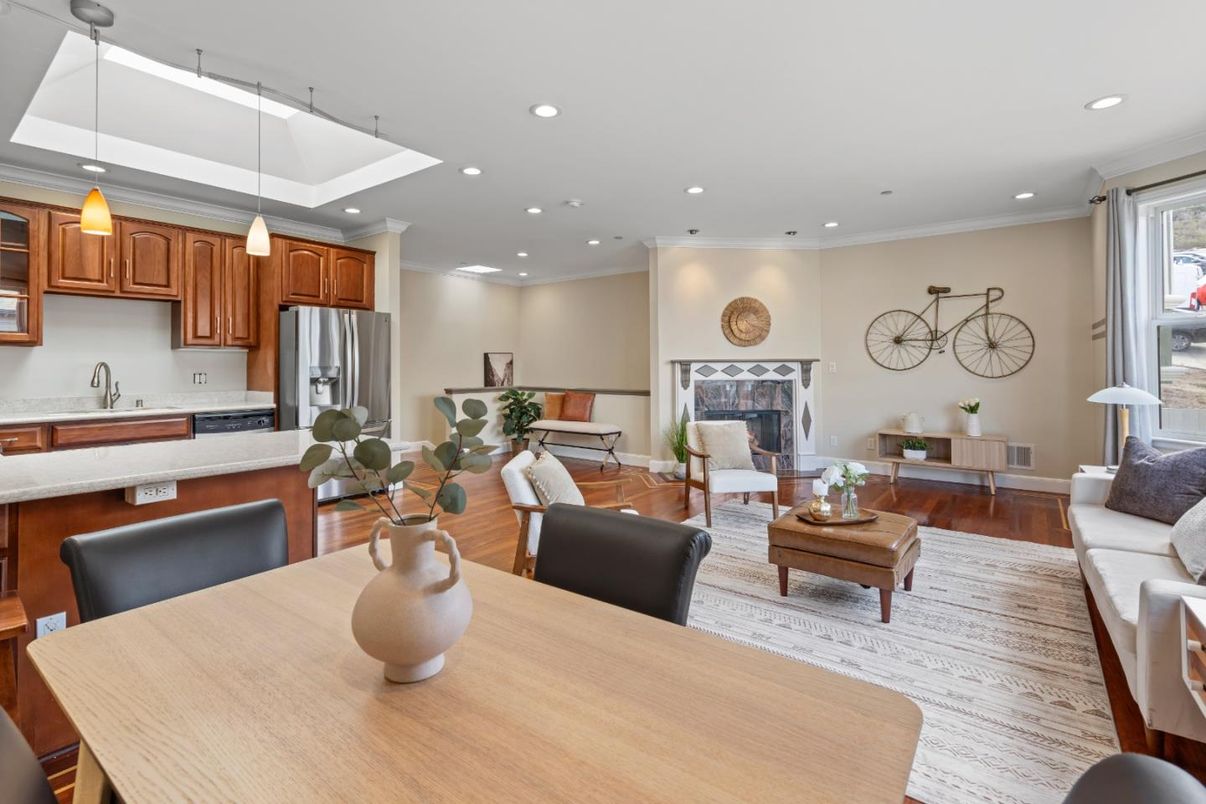 Dining room, Fireplace, Interior, Kitchen, Living room, Pendant Lights, Recessed Lighting, Stainless Steel Appliances, Wood Texture Flooring