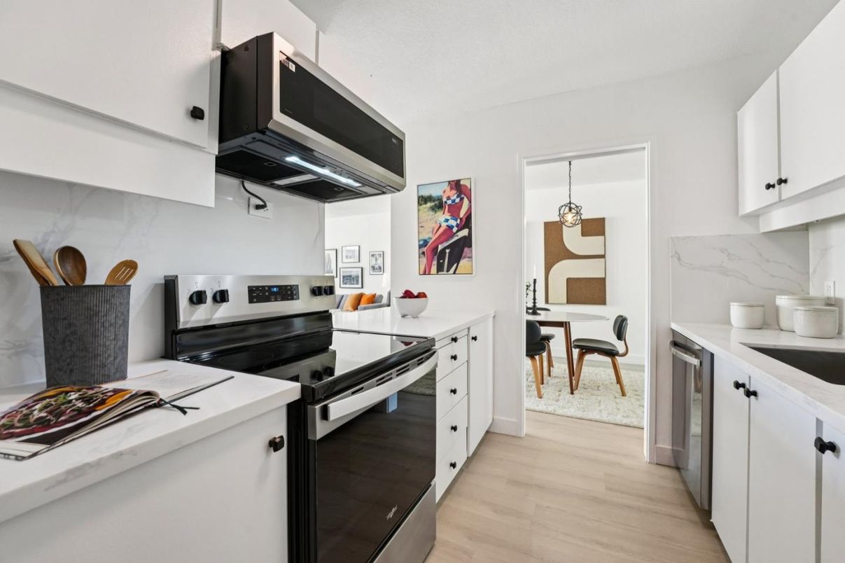 Dining room, Interior, Kitchen, Pendant Lights, Stainless Steel Appliances, Wood Texture Flooring