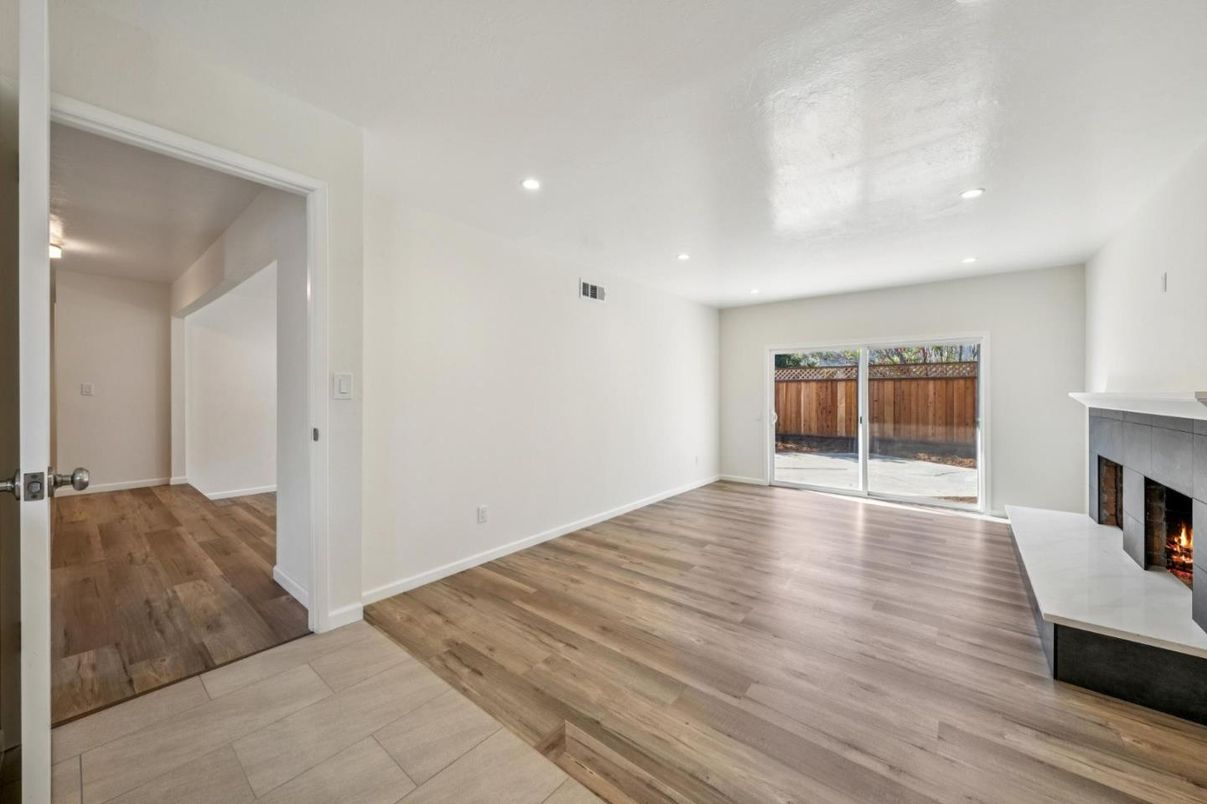 Empty room, Fireplace, Interior, Recessed Lighting, Wood Texture Flooring