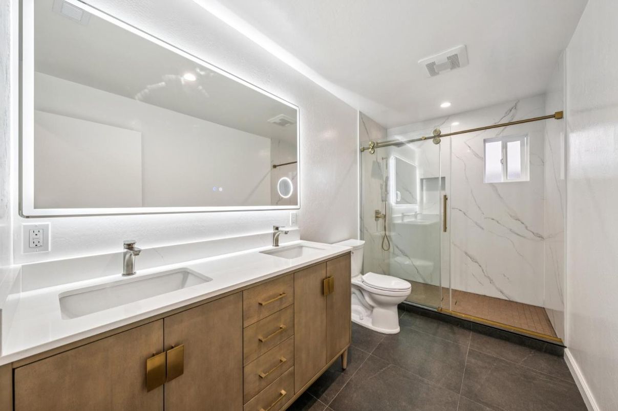 Bathroom, Dual Sink Vanities, Glass Shower, Interior, Marble Walls, Recessed Lighting