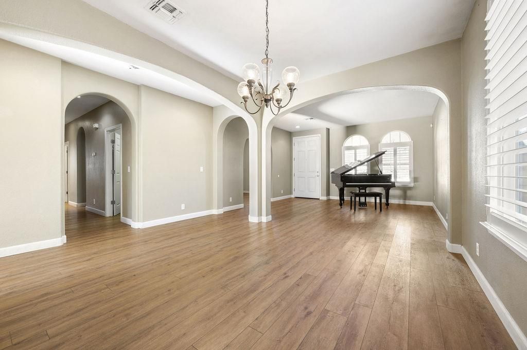 Chandelier, Interior, Piano, Recessed Lighting, Wood Texture Flooring