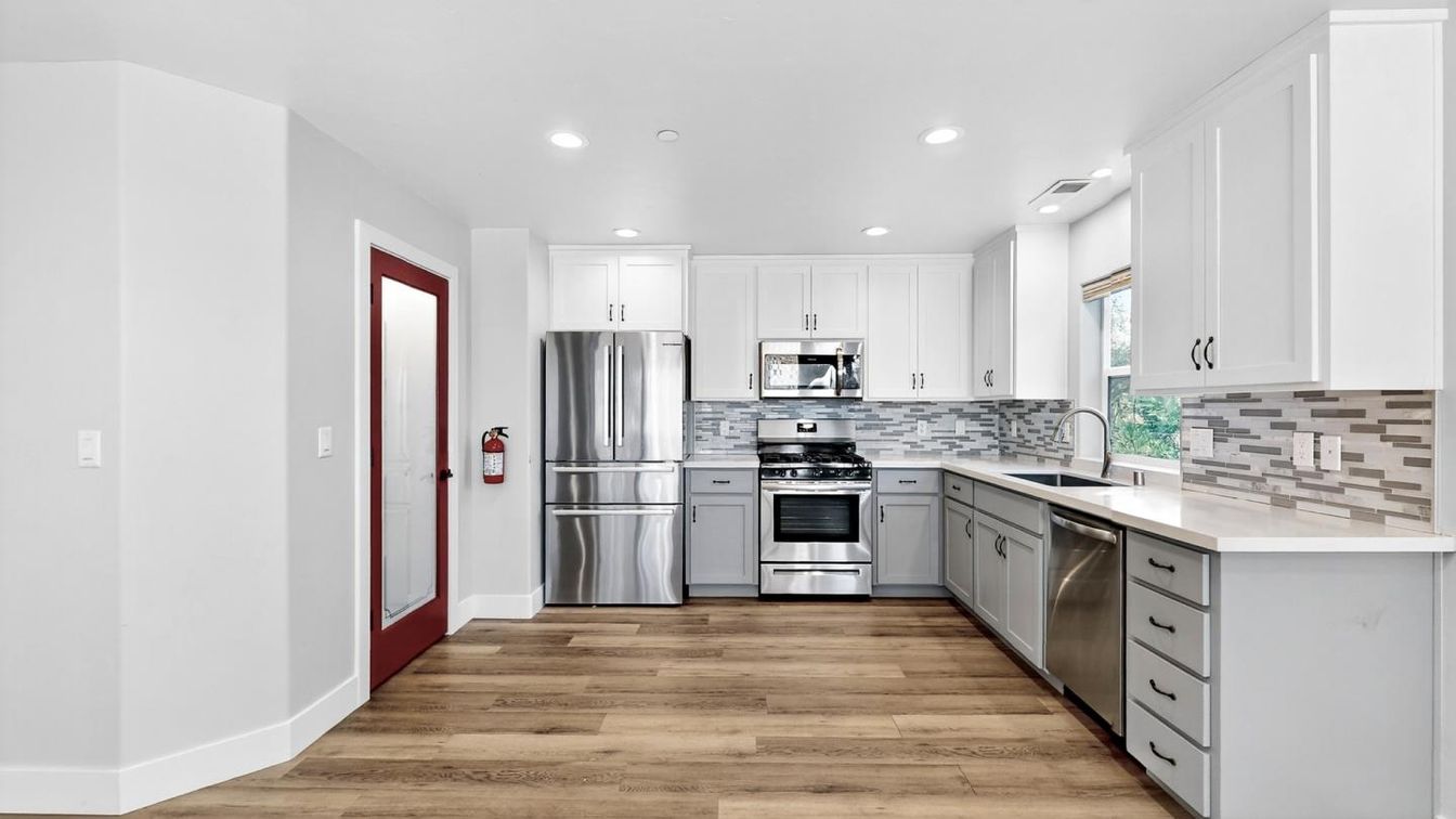 Interior, Kitchen, Recessed Lighting, Stainless Steel Appliances, Wood Texture Flooring