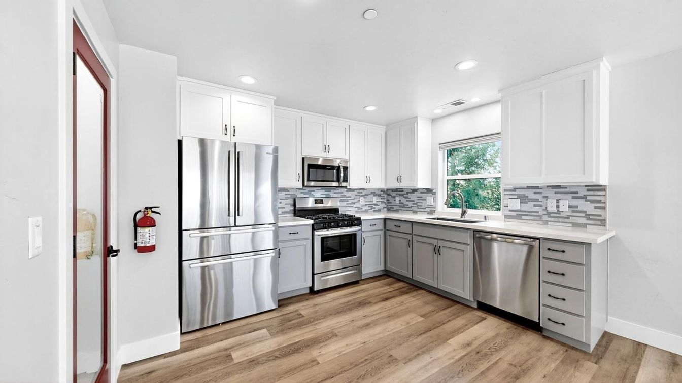 Interior, Kitchen, Recessed Lighting, Stainless Steel Appliances, Wood Texture Flooring