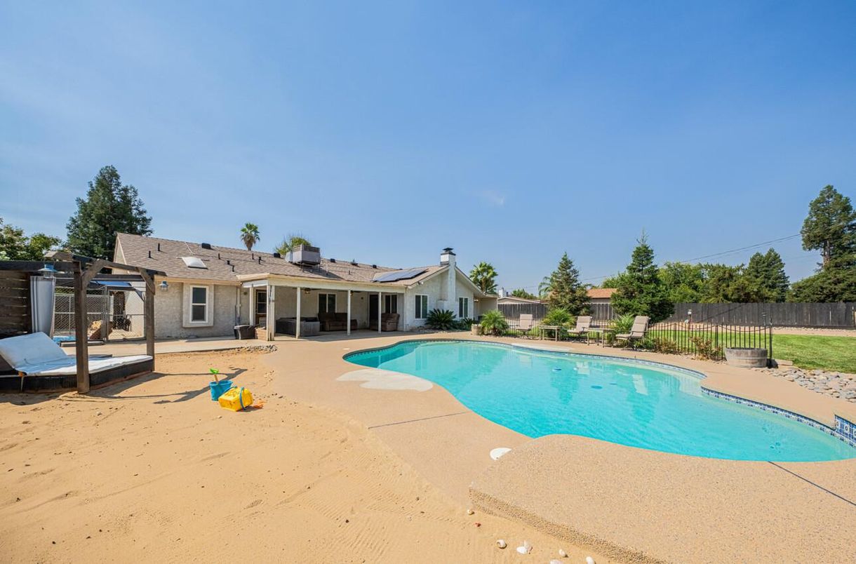 Exterior, Pool, Solar Panels