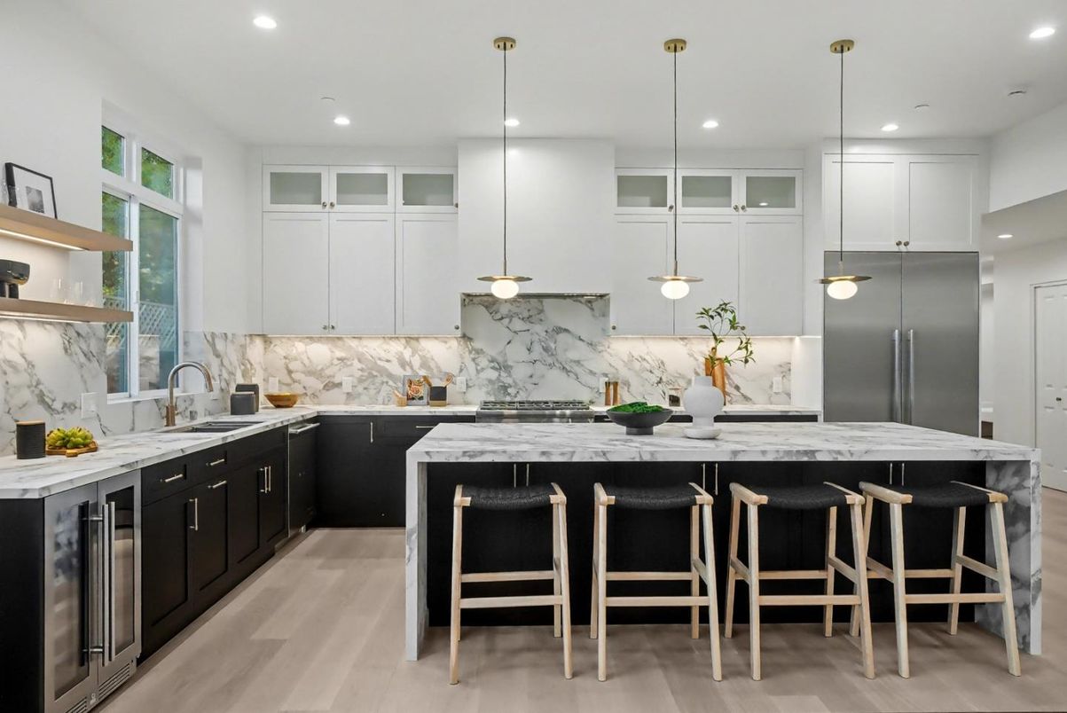 Interior, Kitchen, Marble Walls, Pendant Lights, Recessed Lighting, Stainless Steel Appliances, Wood Texture Flooring