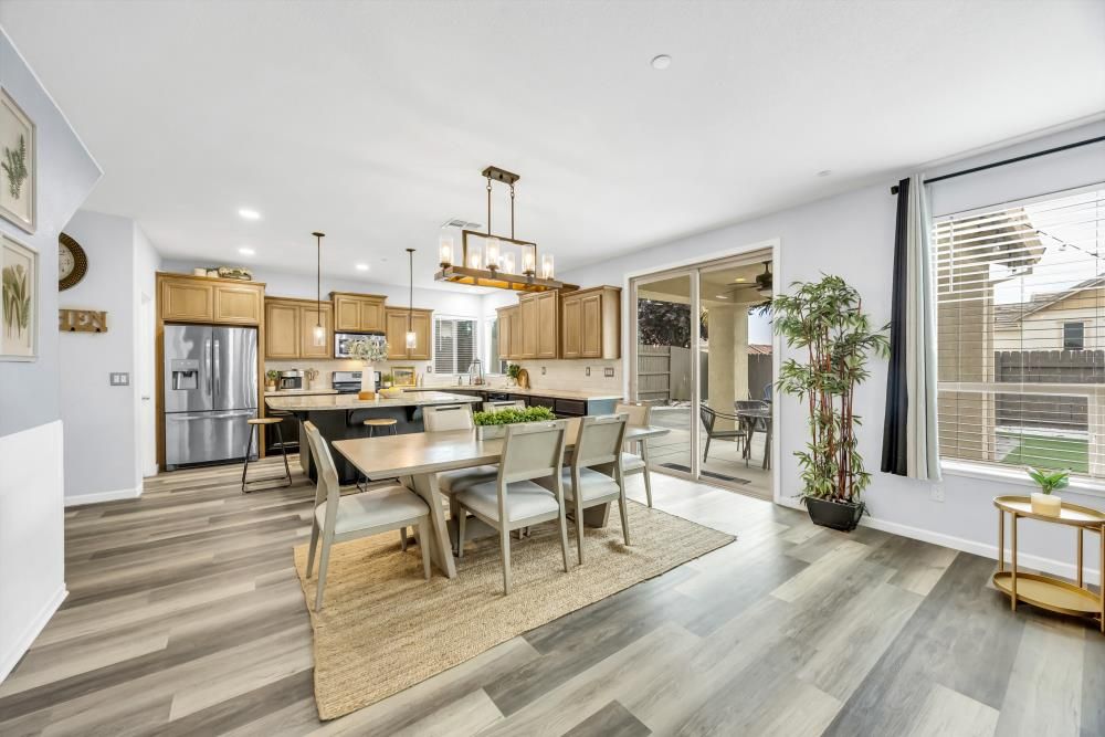 Dining room, Interior, Kitchen, Pendant Lights, Recessed Lighting, Stainless Steel Appliances, Wood Texture Flooring