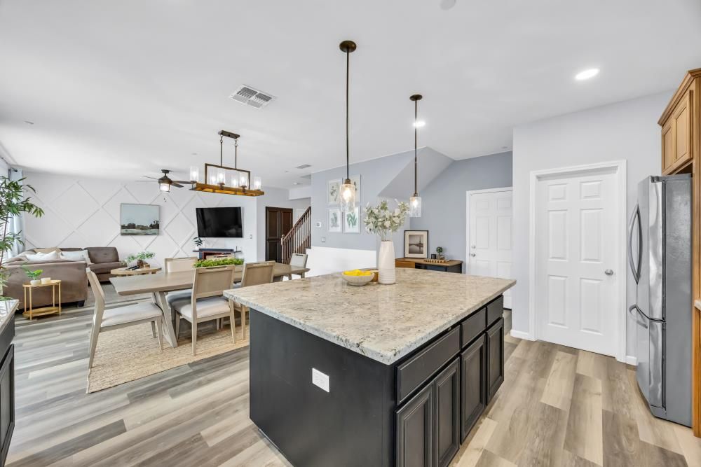 Dining room, Interior, Kitchen, Pendant Lights, Recessed Lighting, Stainless Steel Appliances, Wood Texture Flooring