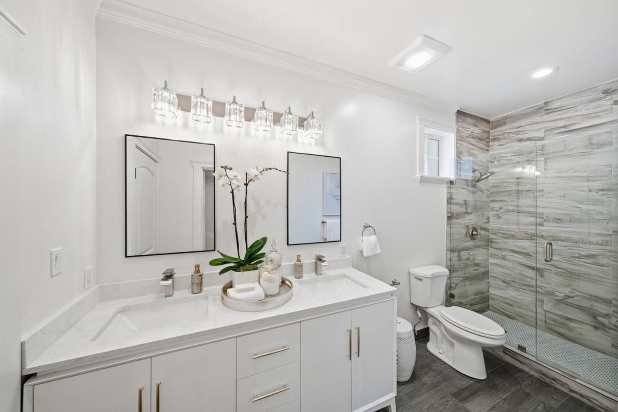 Bathroom, Dual Sink Vanities, Glass Shower, Interior, Recessed Lighting, Wood Texture Flooring