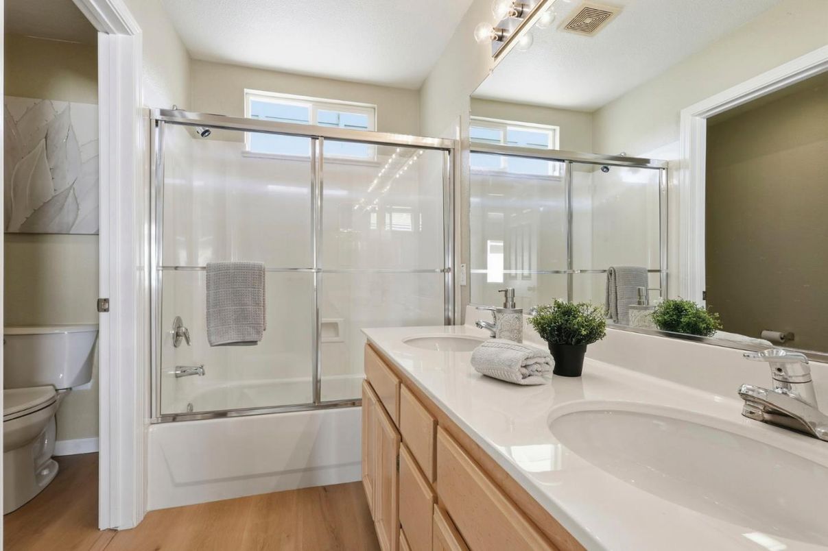 Bathroom, Dual Sink Vanities, Glass Shower, Interior, Wood Texture Flooring