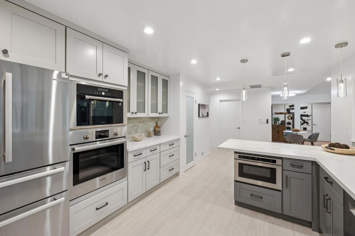 Dining room, Interior, Kitchen, Pendant Lights, Recessed Lighting, Stainless Steel Appliances, Wood Texture Flooring