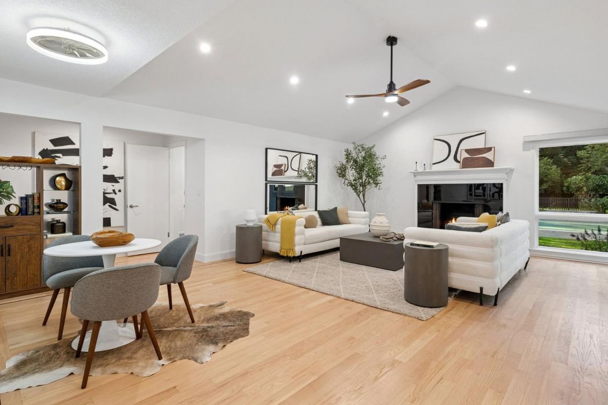 Dining room, Fireplace, Interior, Living room, Recessed Lighting, Wood Texture Flooring