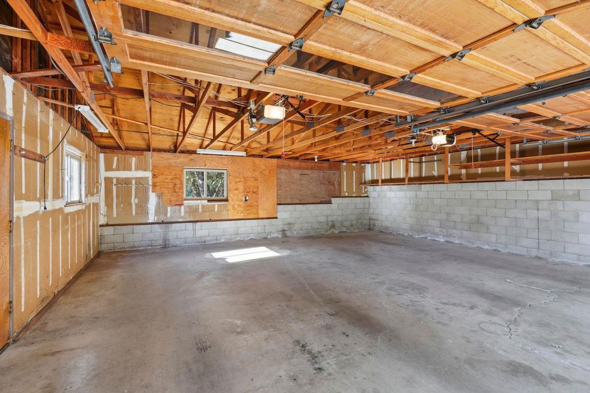 Garage, Interior, Stone Walls, Wooden Beams