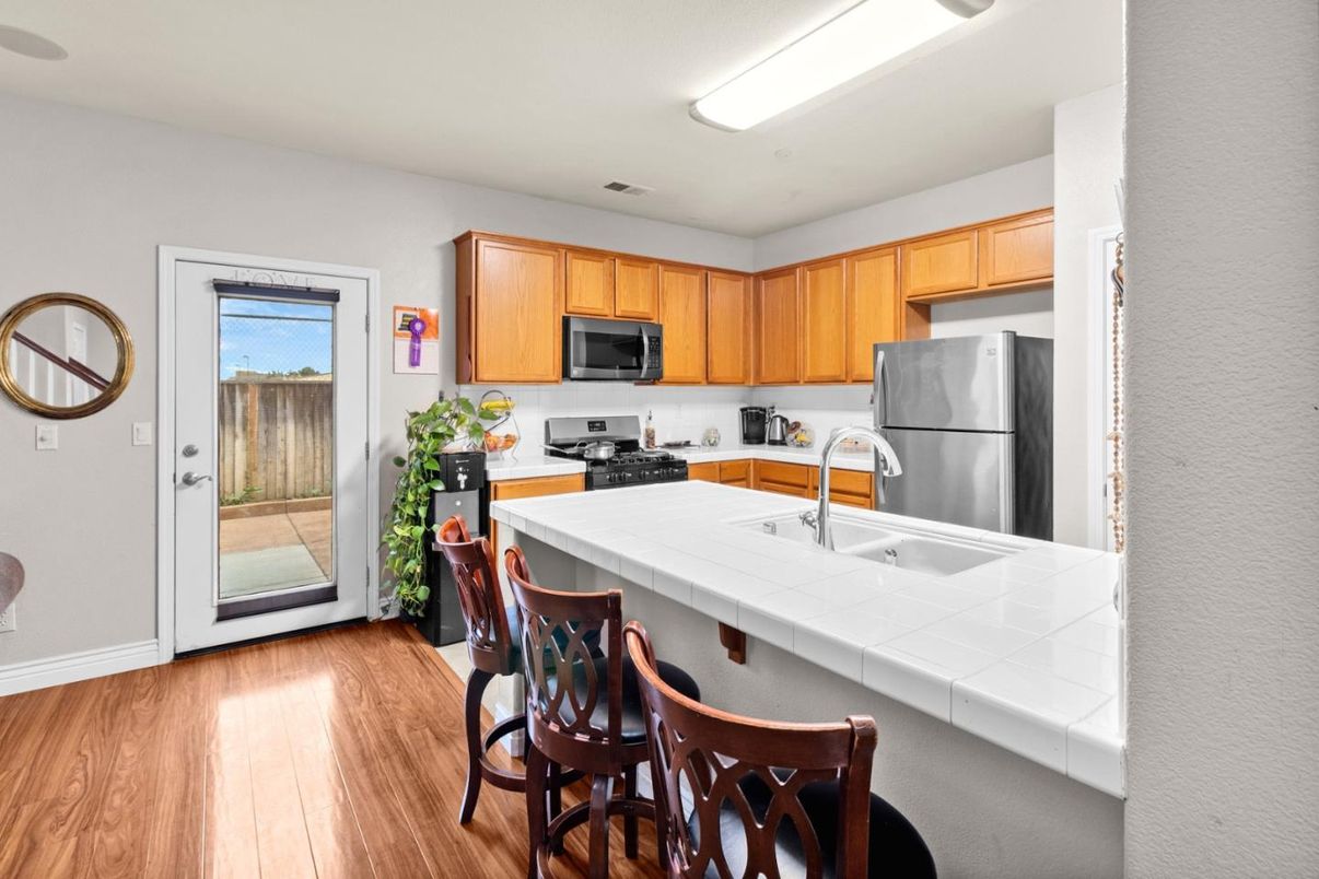 Interior, Kitchen, Tile Countertops, Wood Texture Flooring