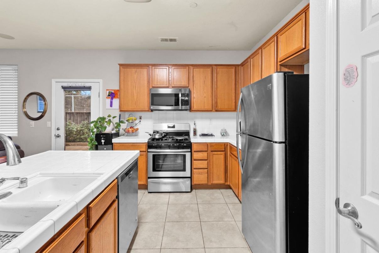 Interior, Kitchen, Stainless Steel Appliances, Tile Countertops