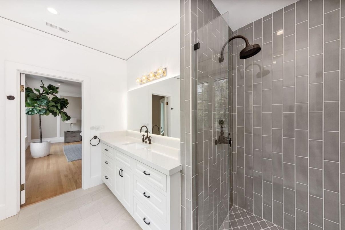 Bathroom, Dual Sink Vanities, Glass Shower, Interior, Recessed Lighting, Wood Texture Flooring