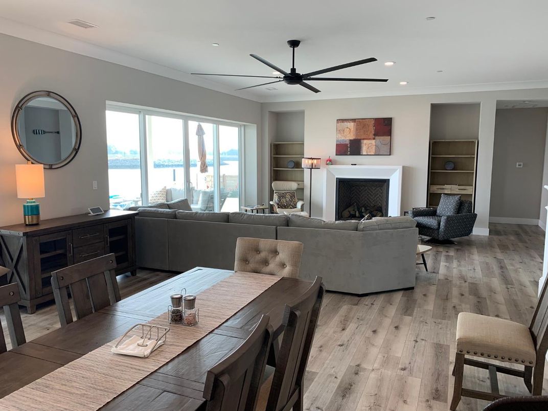 Dining room, Fireplace, Interior, Living room, Recessed Lighting, Wood Texture Flooring