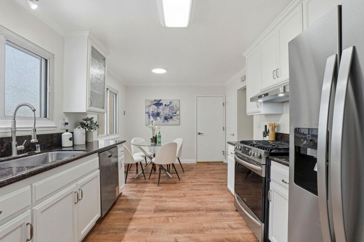 Dining room, Interior, Kitchen, Recessed Lighting, Stainless Steel Appliances, Wood Texture Flooring