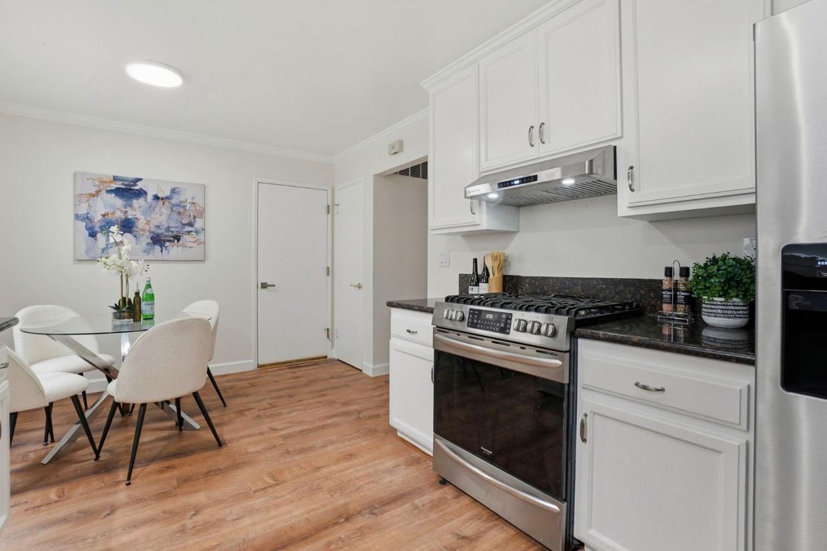 Dining room, Interior, Kitchen, Recessed Lighting, Stainless Steel Appliances, Wood Texture Flooring