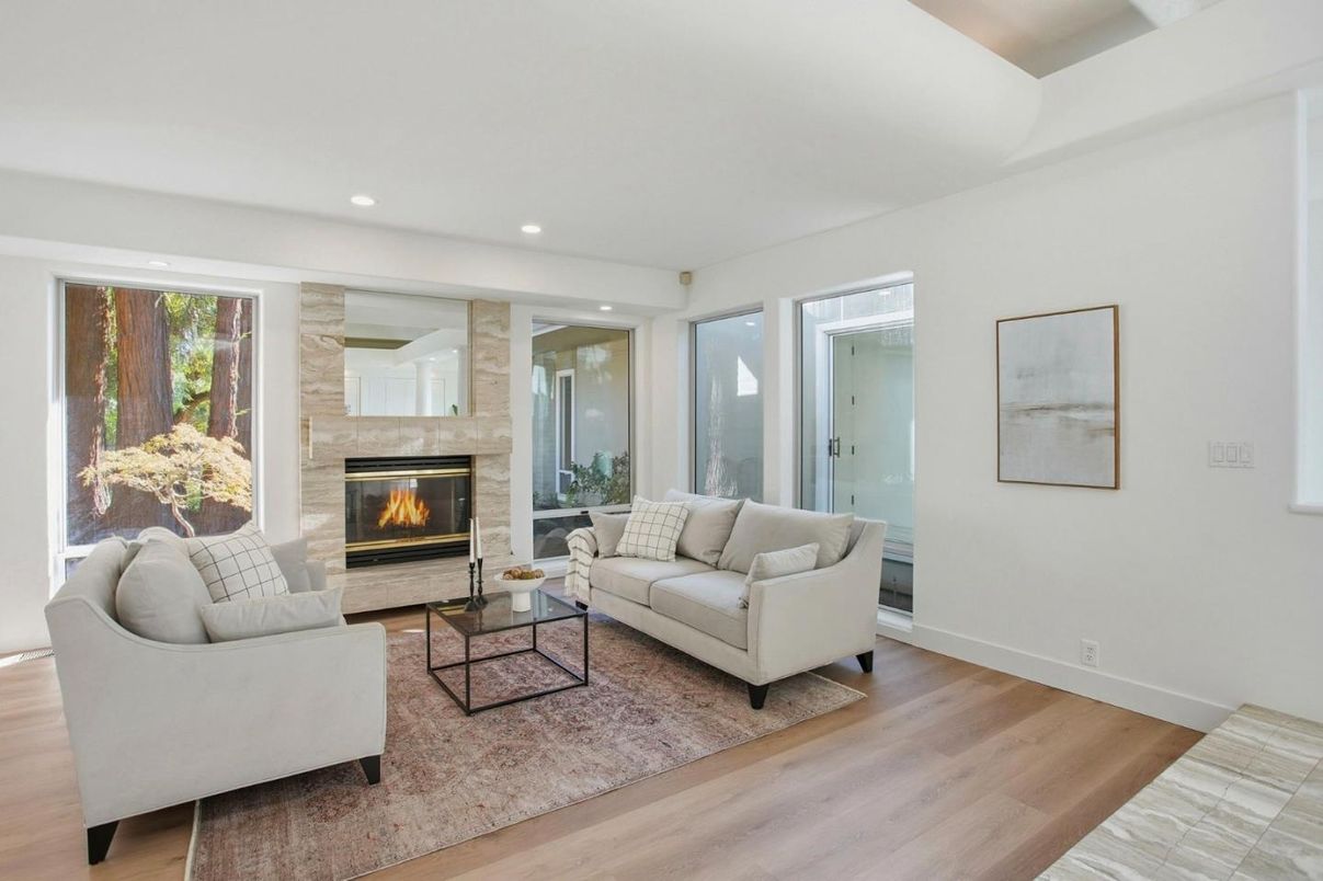 Fireplace, Interior, Living room, Recessed Lighting, Stone Walls, Wood Texture Flooring