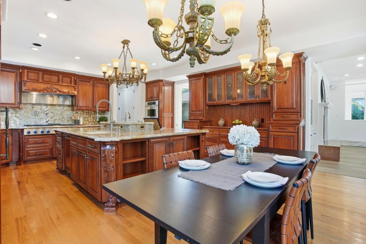 Chandelier, Dining room, Interior, Kitchen, Recessed Lighting, Stainless Steel Appliances, Wood Texture Flooring
