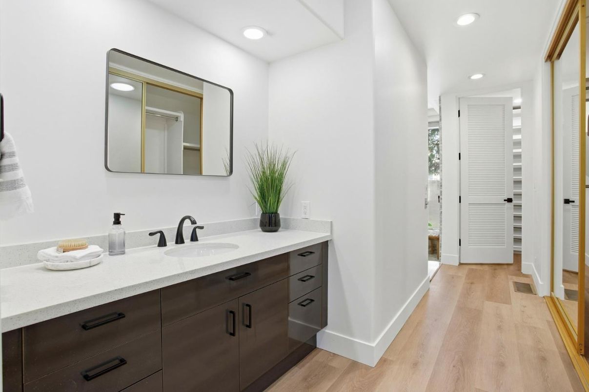 Bathroom, Dual Sink Vanities, Interior, Recessed Lighting, Wood Texture Flooring