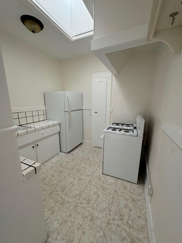 Interior, Kitchen, Tile Countertops, Washer