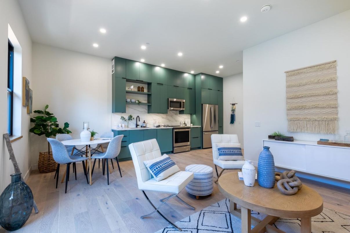 Dining room, Interior, Kitchen, Living room, Recessed Lighting, Stainless Steel Appliances, Wood Texture Flooring